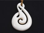 Premier twist and koru bone pendant