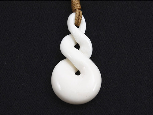 Premier twist bone carving pendant