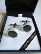 Round greenstone cufflinks set in silver alloy