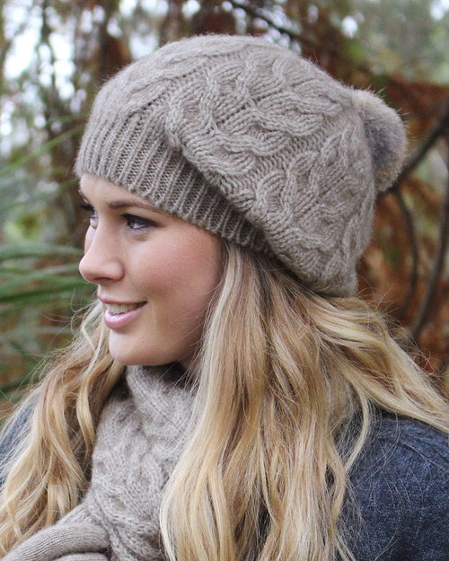 Merino Cable Hat with Fur Pompom